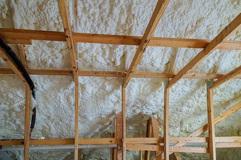Roof deck spray foam insulation